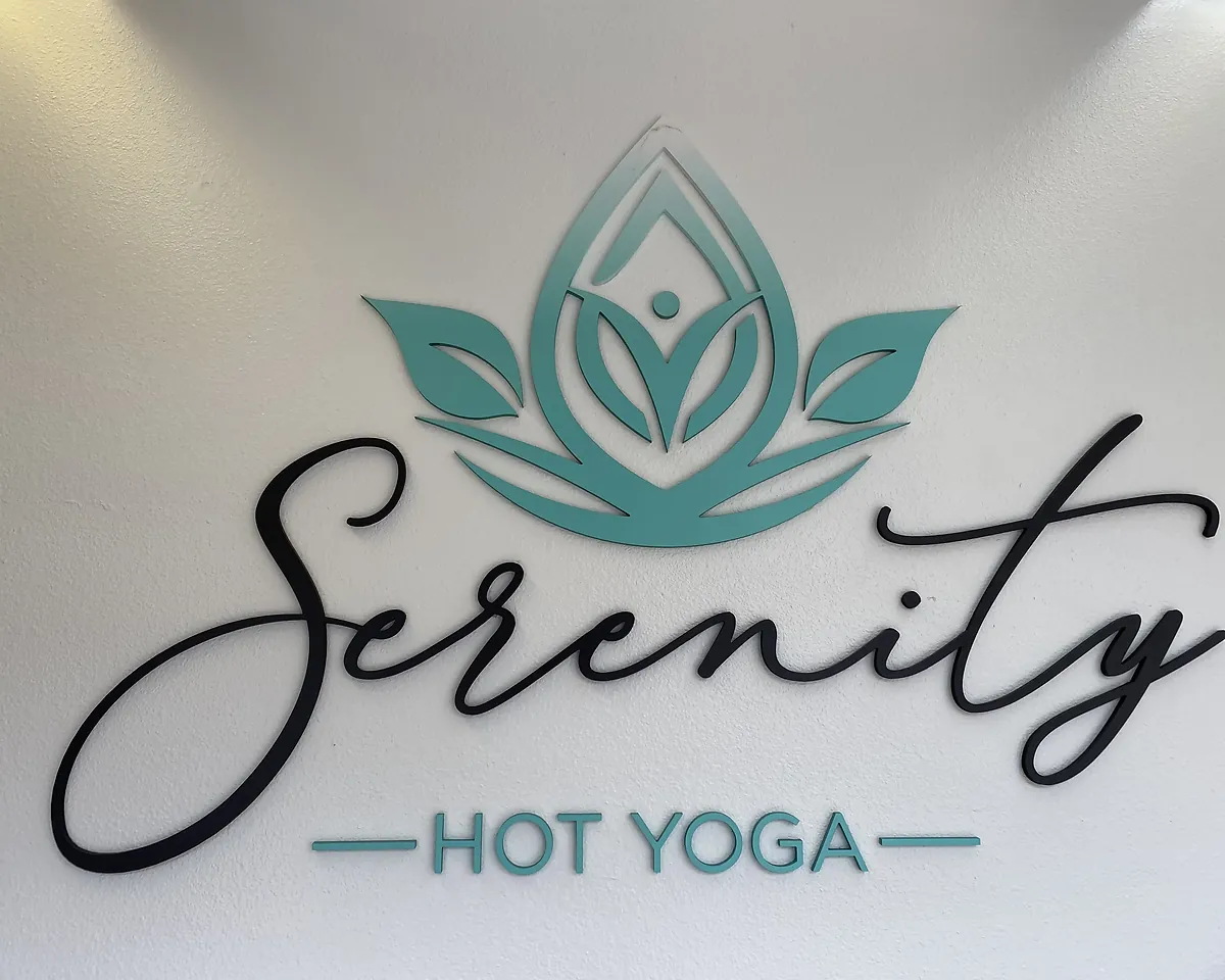 Serenity Hot Yoga logo sign on the front office wall, Newhall CA